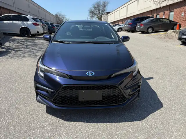 2025 Toyota Corolla Hybrid SE CVT AWD, SUNROOF, ALLOY WHEELS - Photo 2