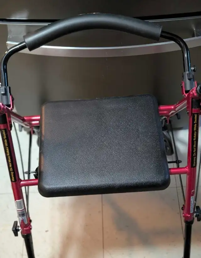 4 Wheeled walker with seat/storage basket - Photo 2