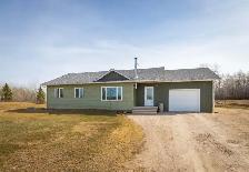 Modern & well-maintained 3bdrm bungalow situated on 2  acres!