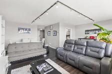 Bright & Open 800sqft Condo offering panoramic city views! - Photo 4