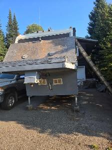 2003 29' wheel flatdeck with 9.5' Okanagan camper