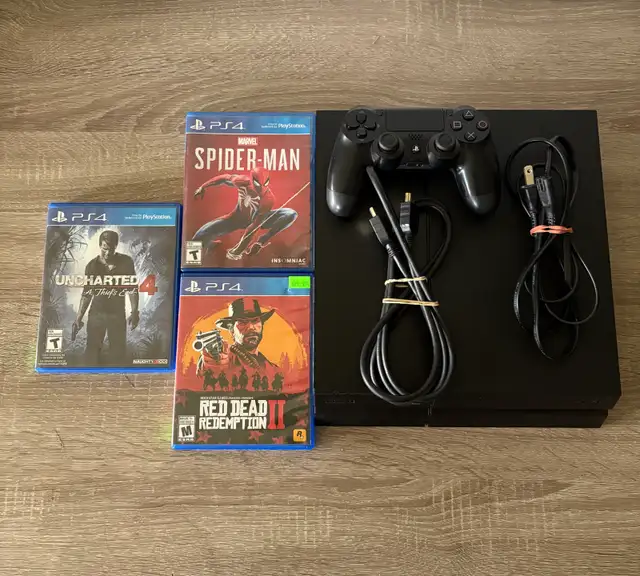 PS4 w/ 3 games, 1 controller