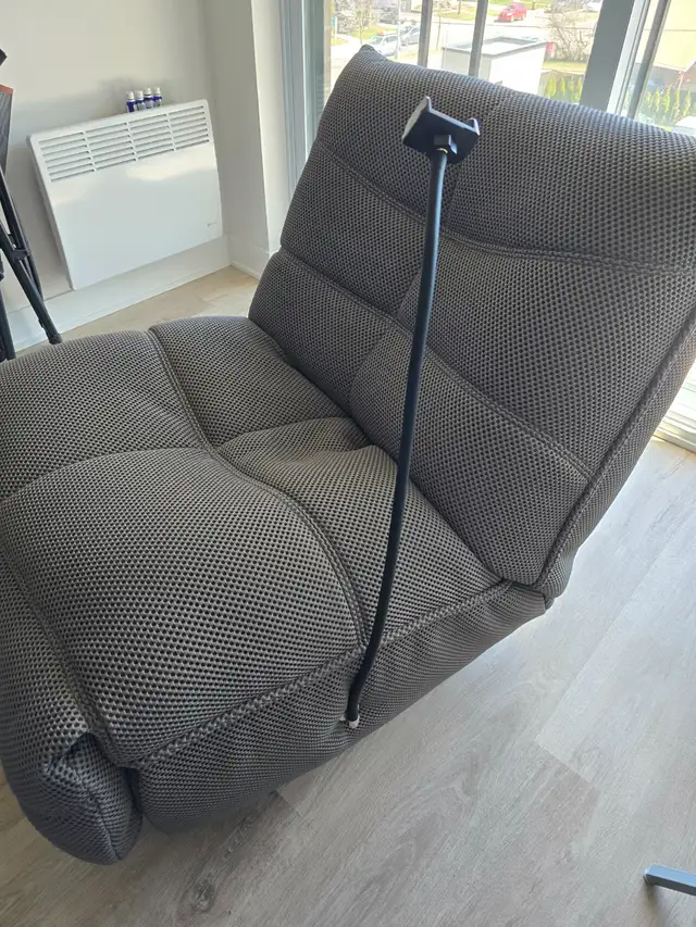 Fauteuil très confortable en tissu berçant pivotant