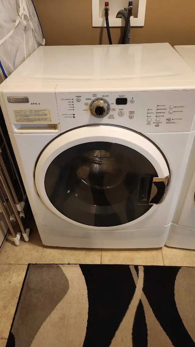 Front load washer and dryer - Photo 2