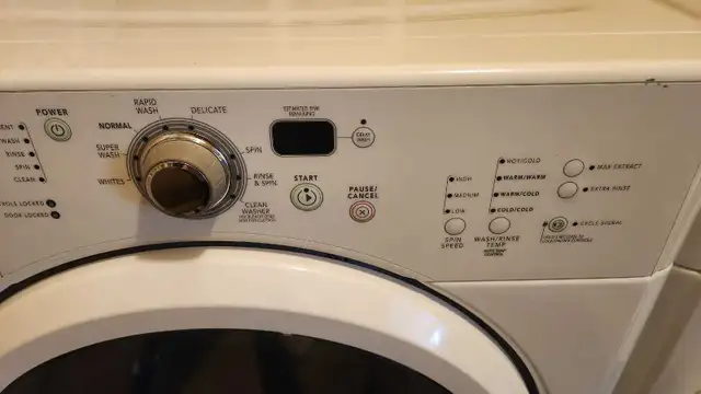 Front load washer and dryer - Photo 6