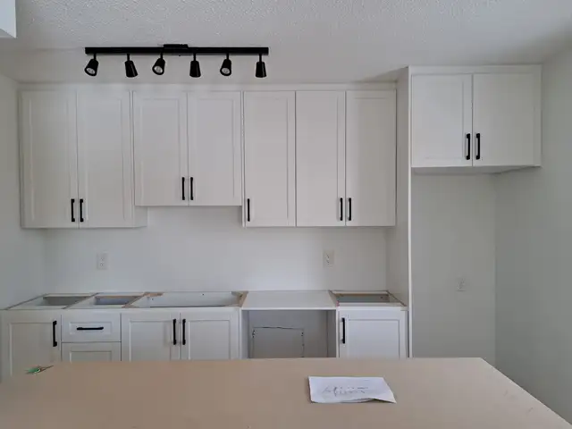 Renovated 2 bedroom   den in quiet West end building