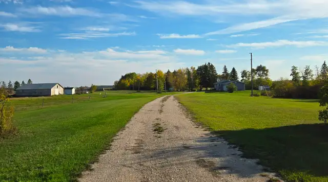 3  bedroom bungalow w/established yard & 80 acres land - Photo 2