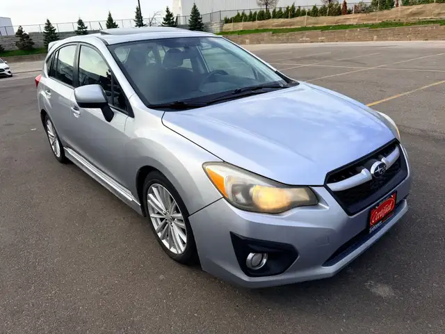 2012 Subaru Impreza 4dr 2.0i w/Touring Pkg