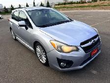 2012 Subaru Impreza 4dr 2.0i w/Touring Pkg