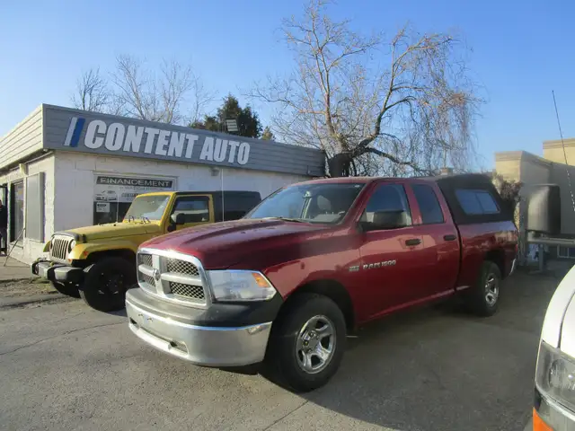 Ram 1500 4WD Quad Cab 140.5' ST inspecte garantie financement ma