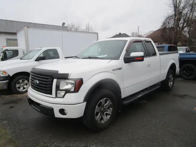 Ram 1500 4WD Quad Cab 140.5' ST inspecte garantie financement ma - Photo 40