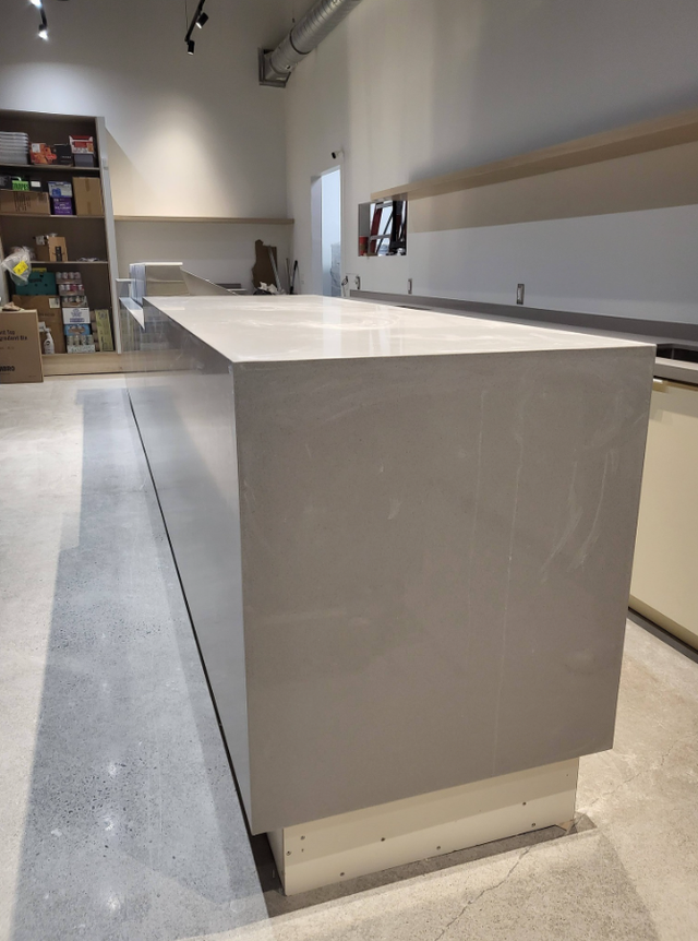 Quartz Countertop - With Grey Veins - Photo 6
