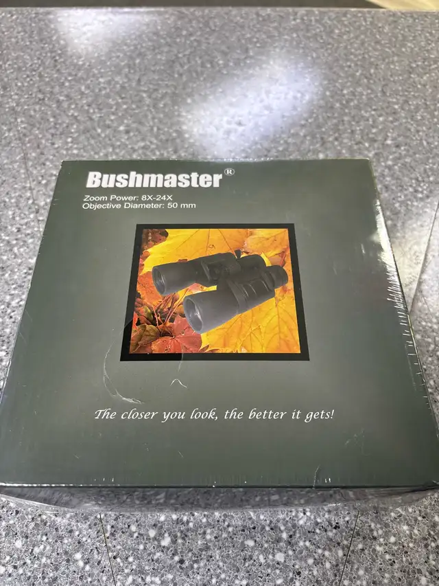 Bushmaster Binoculars Zoom Power 8 -24x in box