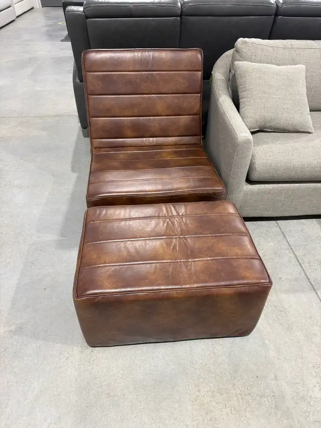 Brown foam lounge chair with ottoman - Photo 2