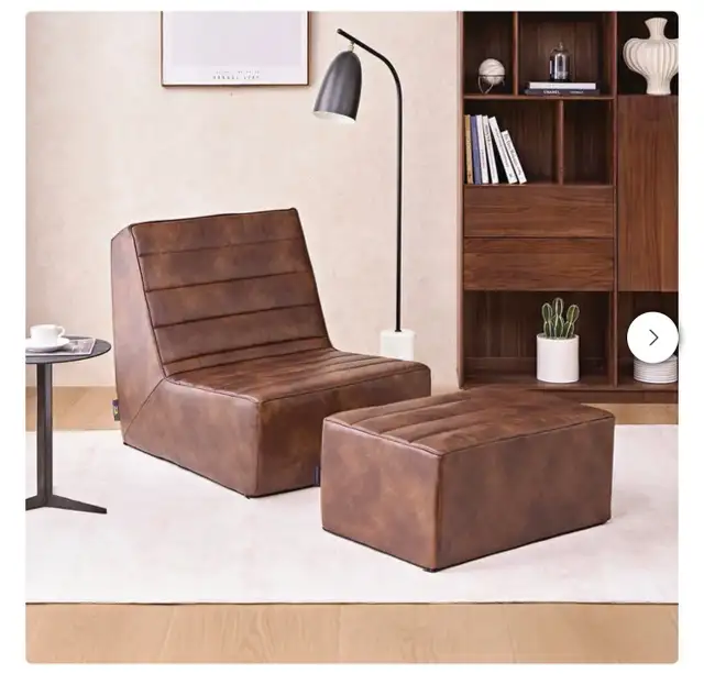Brown foam lounge chair with ottoman - Photo 3