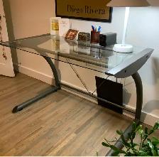 Desk, glass and steel, mint condition.  $25 West Calgary