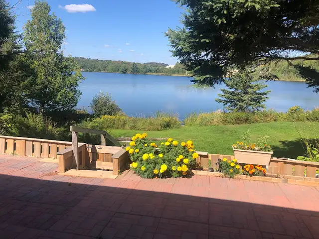 Lakefront Living: upgraded home w self contained basement unit