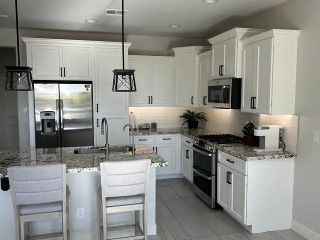 Cabinet Handles - Photo 8