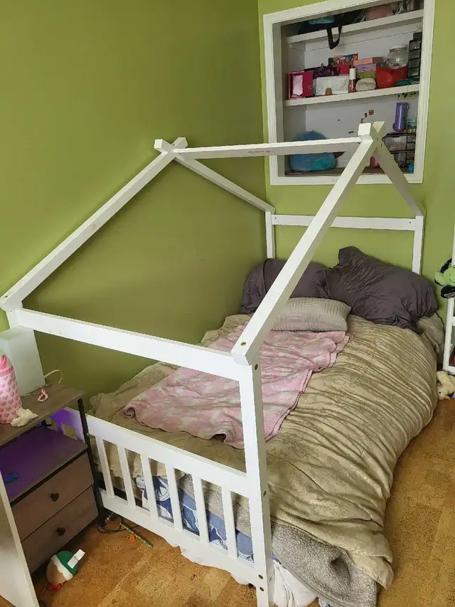 girls single bed frame with mattress.