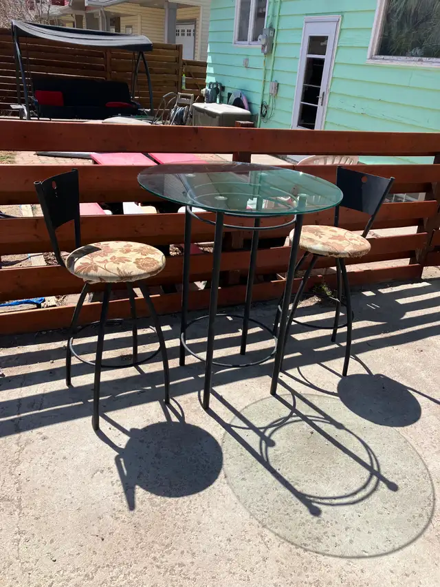 Bar height table with two chairs