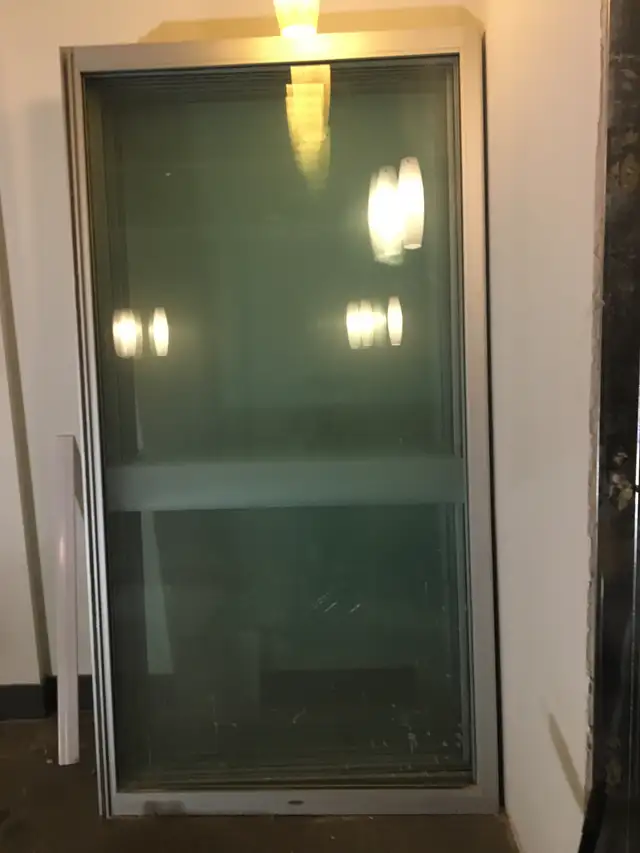 8 aluminum and glass store front sliding doors and tracks