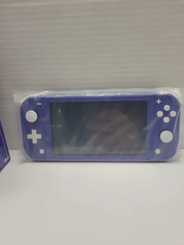 Nintendo Switch Lite (Like New) - Photo 2
