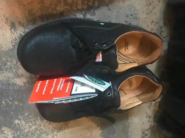 Brand new man's steel toe safety shoes, size 8.5
