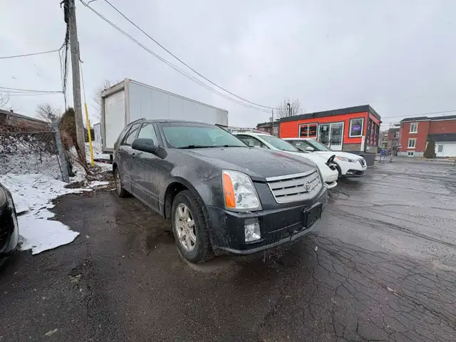 Cadillac SRX 2008 aut. Cruir. toit. $4495. rusty 450-820-0550