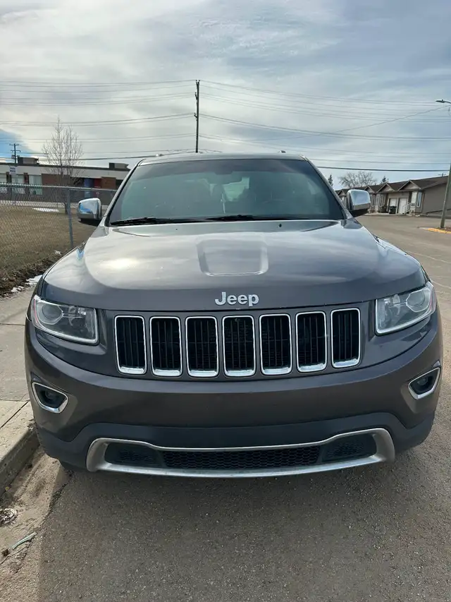 2015 Jeep Grand Cherokee Limited w/ aftermarket rims & New Tires - Photo 2