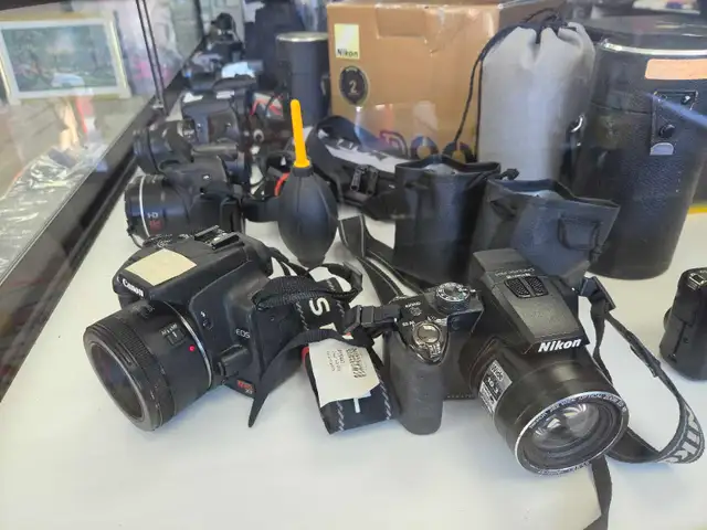 We Buy Cameras - Photo 8