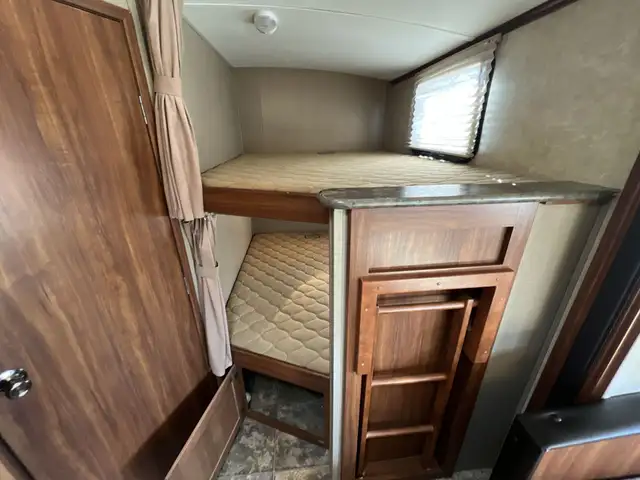 Family-Friendly Travel Trailer Featuring Double Bunks - Photo 11