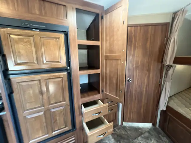 Family-Friendly Travel Trailer Featuring Double Bunks - Photo 17