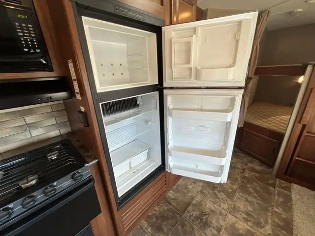Family-Friendly Travel Trailer Featuring Double Bunks - Photo 19