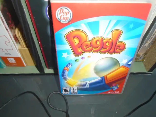 Pop Cap Games - Peggle - Luck and Skill and Joyous Thrills!