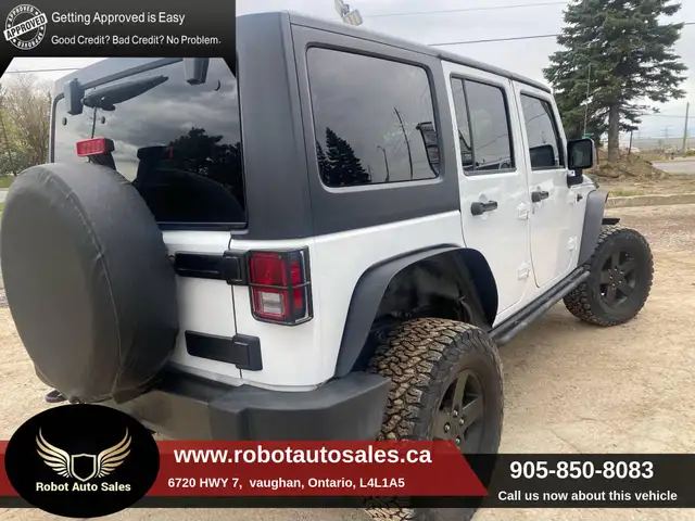 2016 Jeep WRANGLER UNLIMITED 4WD 4dr Sport - Photo 2