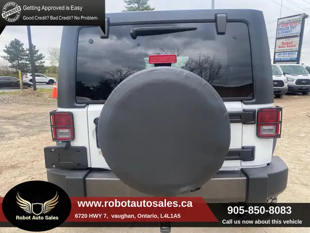 2016 Jeep WRANGLER UNLIMITED 4WD 4dr Sport - Photo 4