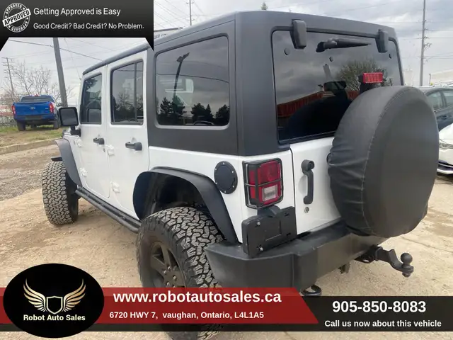 2016 Jeep WRANGLER UNLIMITED 4WD 4dr Sport - Photo 5