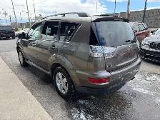 2010 MITSUBISHI Outlander XLS / V6 / AWD / 7 PASSAGERS - Photo 6