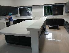 White Quartz Countertop - With Black Island