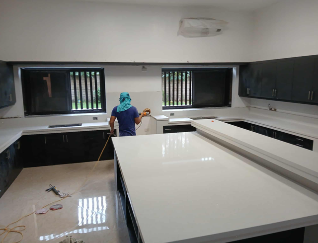 White Quartz Countertop - With Black Island - Photo 2
