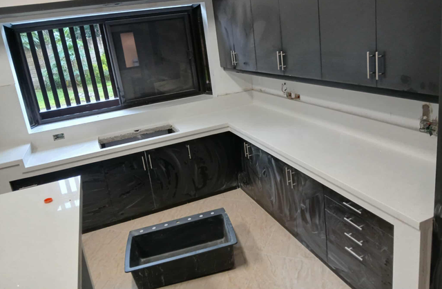 White Quartz Countertop - With Black Island - Photo 4