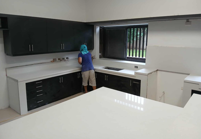 White Quartz Countertop - With Black Island - Photo 6