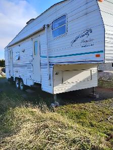 2000 prowler 5th wheel camper needs front fixed part