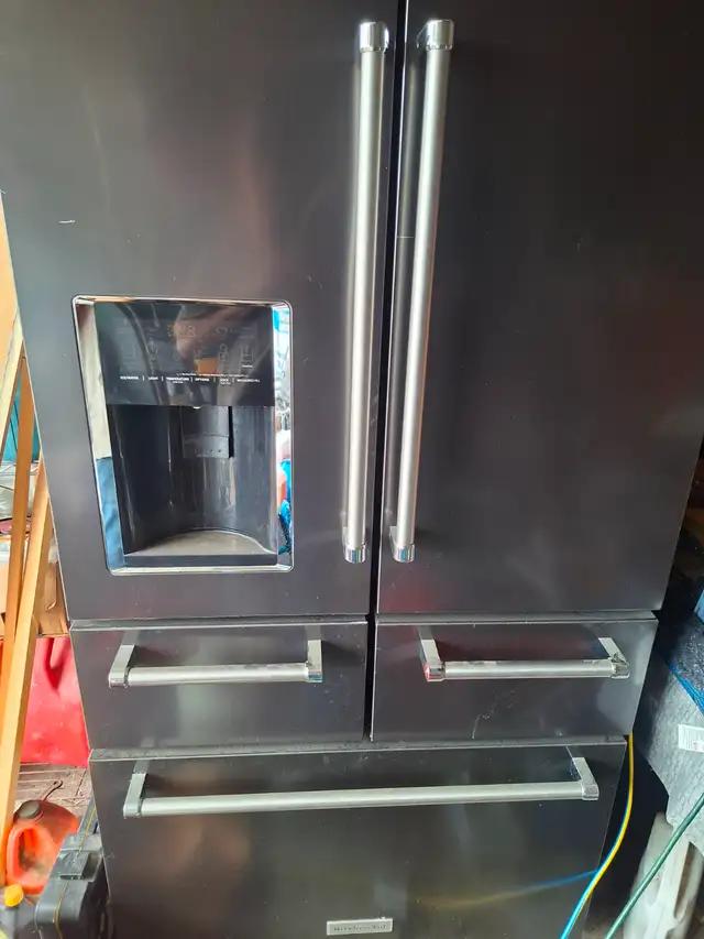 Fridge with ice maker and water filter.
