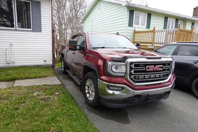 For Sale a 2016 GMC Sierra Crew Cab with short box