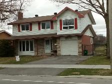 Single home in Carleton Heights with fenced-in private yard.