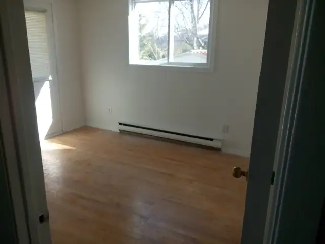Single home in Carleton Heights with fenced-in private yard. - Photo 7