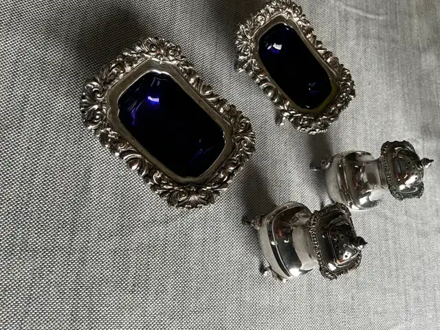 4- pieces cruet set with blue liners $85.00