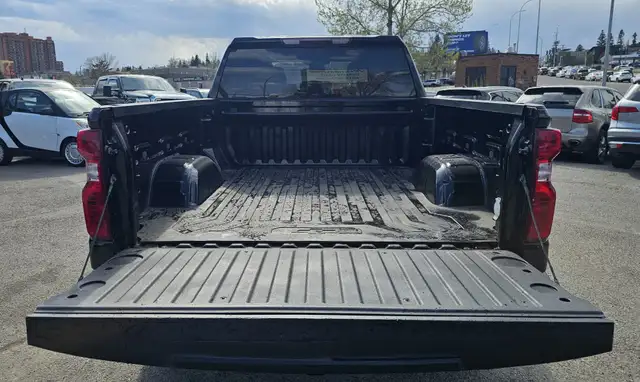This Pickup powered by a Gasoline engine featuring 4WD/4-Wheel D - Photo 6