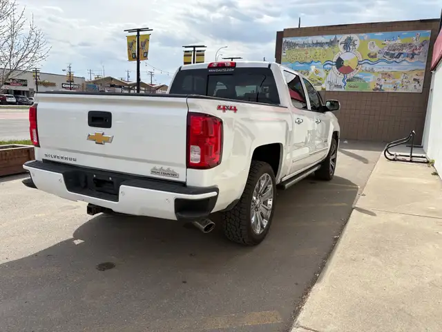 2016 Chevrolet Silverado 1500 4WD Crew Cab 143.5' High Country - Photo 9